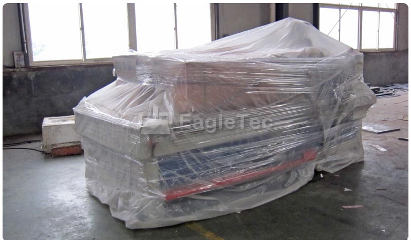 cnc router table tightly wrapped with plastic film photo