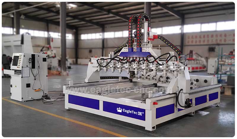 blue multi head cnc router with 4 axis rotary table ready in workshop