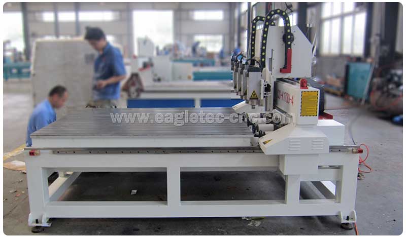 4 axis cnc router woodworking machine with flatbed mounted in workshop