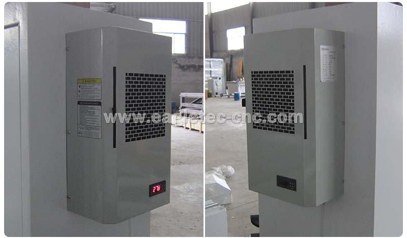 an industrial air conditioner installed on the backside of stone cnc router electrical cabinet 
