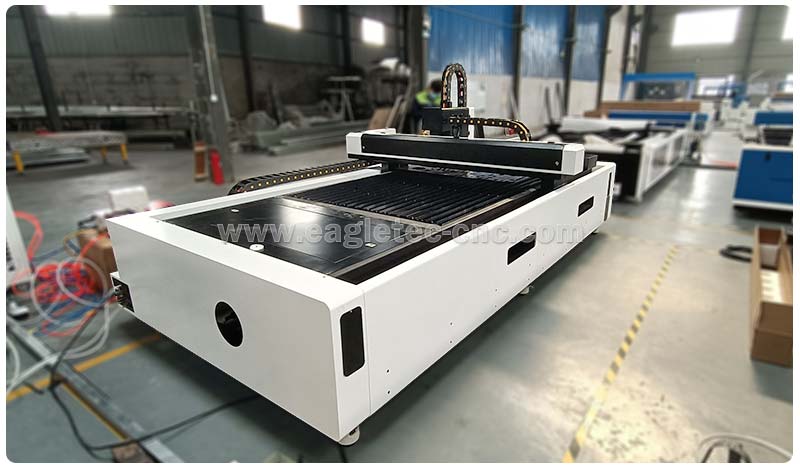 white co2 and fiber laser combo machine in workshop