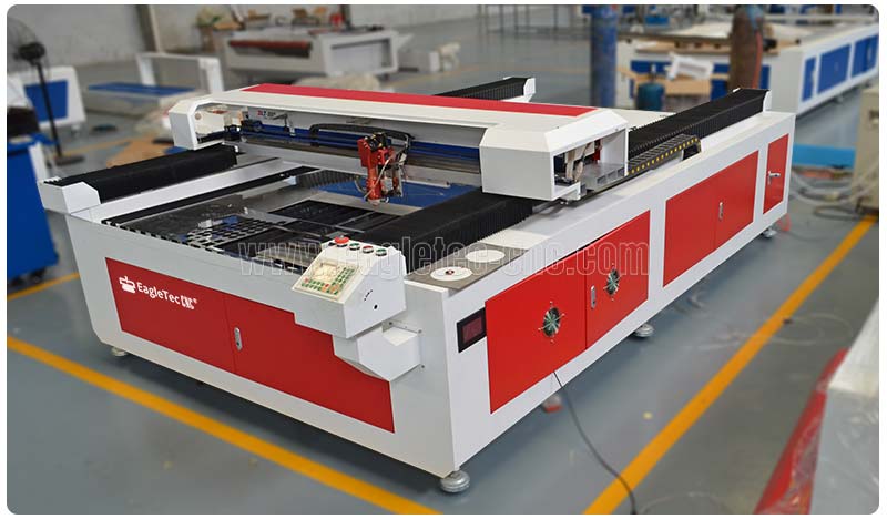 red laser wood and metal cutting machine in the workshop