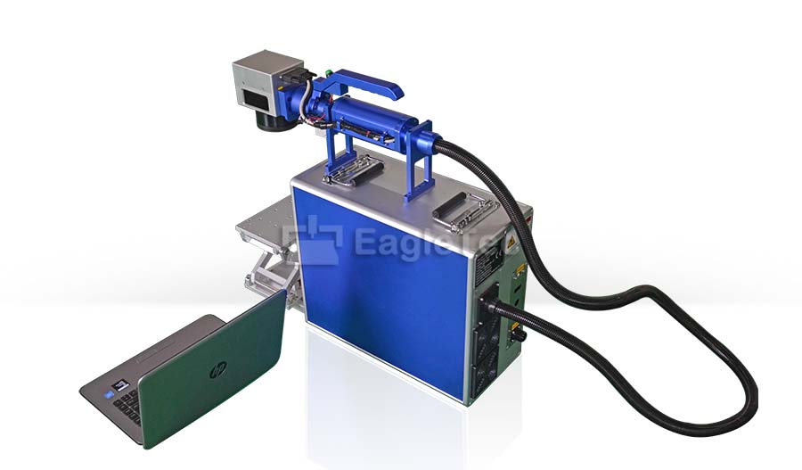 blue laser marking machine handheld with laptop on the side