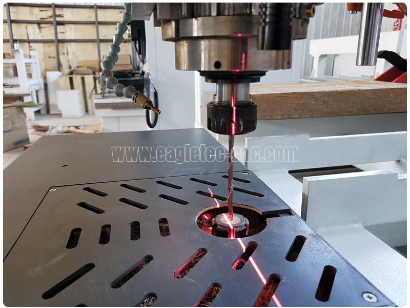 best cnc wood cutting machine with a laser pointer next to the machine head