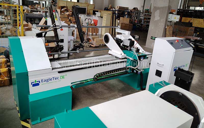 brand new EagleTec CNC wood turning lathe with auto feeder in the plant