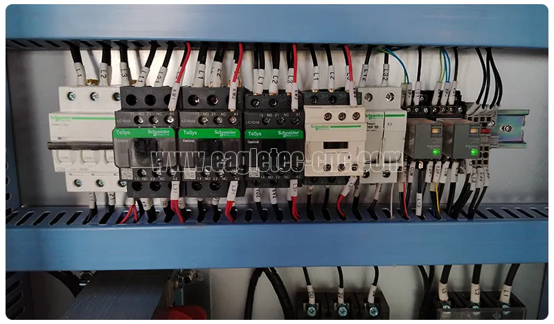 small electronic components in the control cabinet of cnc machine for woodworking