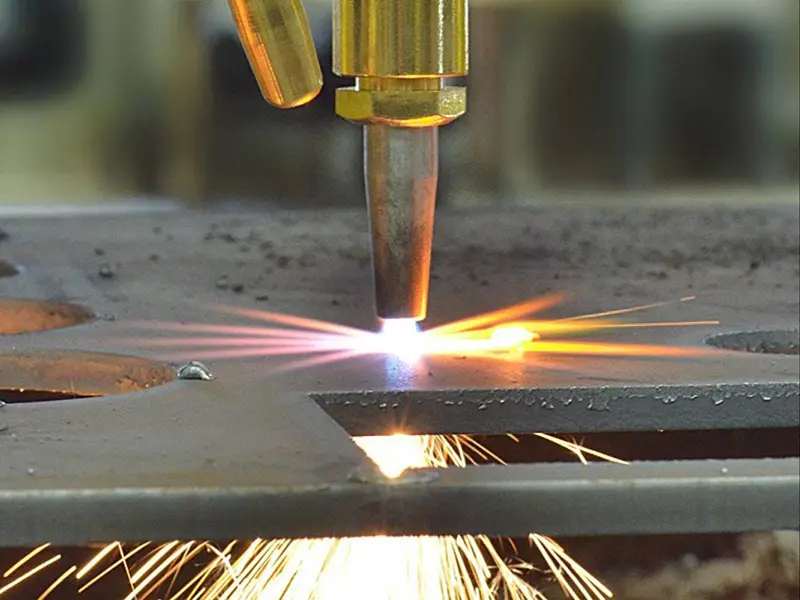CNC oxy-fuel cutting torch in action