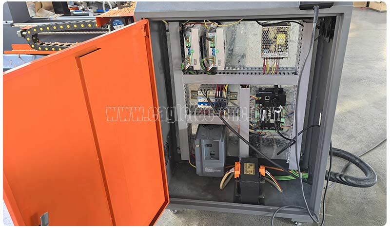 control cabinet with components mounted inside it